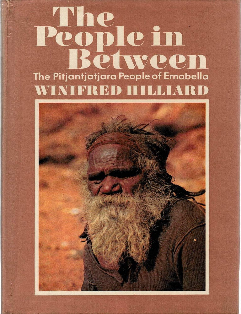 Item #131640 THE PEOPLE IN BETWEEN. The Pitjantjatjara People of Ernabella. Winifred HILLIARD.